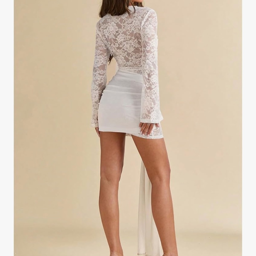 Elegant white lace mini dress. Long sheer lace sleeves and bodice. Twist front b - Picture 4 of 4